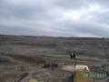 Карьер. Камаз ждет погрузки камнем бутовым фр.300-600